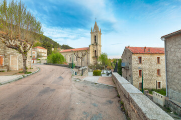 Majestic evening cityscape with Parish Church of the Assumption  in Zonza village