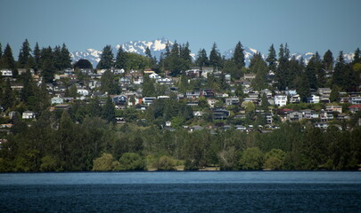 Fototapeta na wymiar Looking at Northern Seattle neighborhood hills across Moss Bay