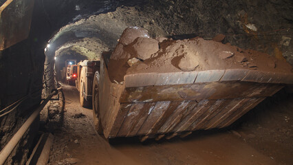 Underground bulldozer. Special load vehicle for mines and tunnels.