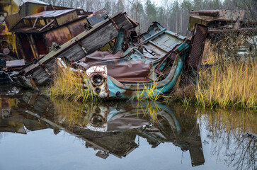 Rusty soviet truck car scrap in the middle of nowhere. Metal recycling