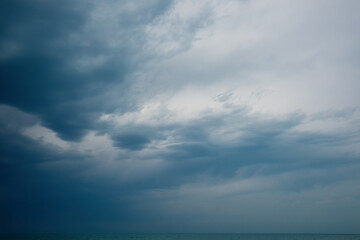 Fototapeta na wymiar blue sea and cloudy sky on summer day.