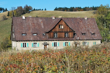 brick building, gable roof, in the mountains © TK_Office