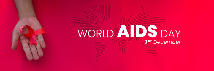 World AIDS Day Background with abstract world map and Hand holding a Red AIDS Ribbon isolated on red background - obrazy, fototapety, plakaty