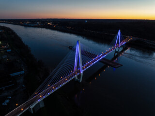 Aerial of Oakley Clark Collins Memorial Bridge at Sunset - Cable-Stayed Suspension - Still Waters of the Ohio River - Russell, Kentucky and Ironton, Ohio - 515490010