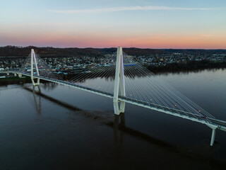 Aerial of Oakley Clark Collins Memorial Bridge at Sunset - Cable-Stayed Suspension - Still Waters of the Ohio River - Russell, Kentucky and Ironton, Ohio - 515490030