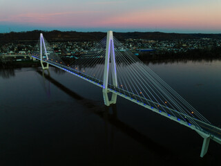 Aerial of Oakley Clark Collins Memorial Bridge at Sunset - Cable-Stayed Suspension - Still Waters of the Ohio River - Russell, Kentucky and Ironton, Ohio - 515490033
