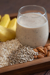 Banana smoothie with oatmeal, sunflower seeds, and almonds