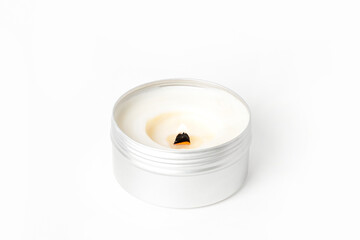 Soy candles in metal cans, handmade modern hobby , harmless coconut wax candles without paraffin on white background isolated