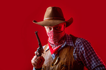 Portrait of a cowboy. American farmer. Portrait of man wearing cowboy hat, gun, macho. West, guns....