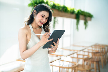 beautiful asian freelance Success people business woman fashion model in summer white sleeveless...