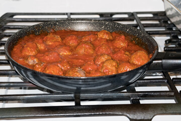 meat  balls in a frying pan