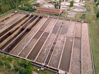 Wastewater treatment plant with sedimentation basin for recycle dirty sewage water, aerial view