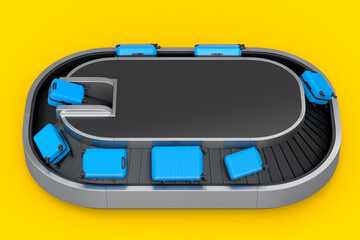 Airport luggage conveyor belt or baggage claim area with suitcases on yellow.
