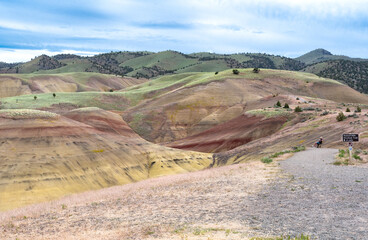 Fototapeta na wymiar Scenic view of the painted hills with a gravel trail in Oregon, United States.