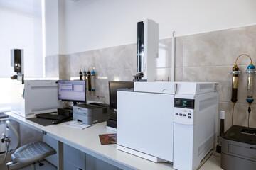 The gas chromatograph system with head space sampler. The system provides reliable capabilities for small or medium labs. Laboratory equipment for product quality control at the food production plant.