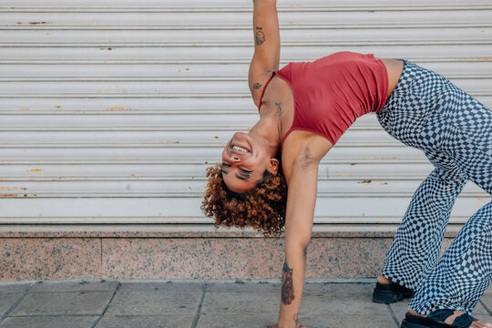 Girl Practicing Modern Urban Dance In The Street