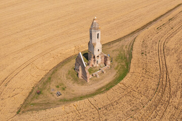 Somogyvámos, Hungary - Aerial view about abandoned church ruin named Pusztatemplom in the middle...