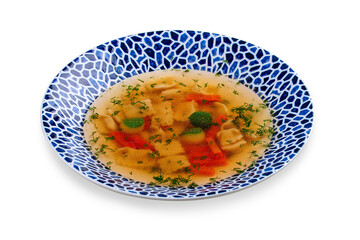 Soup consomme with vermicelli and vegetables. On a white background. Isolated