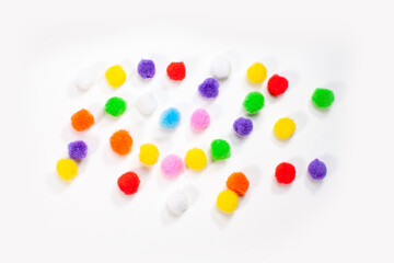 Fototapeta na wymiar fluffy round colorful balls isolated on white background