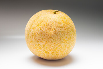 ​​organic raw melon on white background