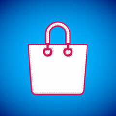 White Paper shopping bag icon isolated on blue background. Package sign. Vector