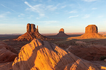 sunrise at west mitten butte in monument valley