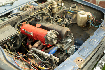 Engine of car. Transport details. Gasoline engine under hood. Sports car.