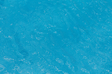 detail of blue water in the pool with reflection