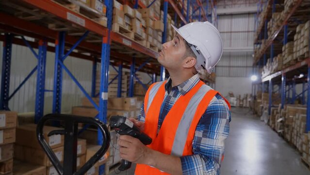 Business concept of 4k Resolution. Employees are collecting product information into the system. barcode scanner.