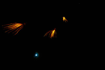 Fireworks sparks on a black sky background. graphic resource for design. Blank for the designer....