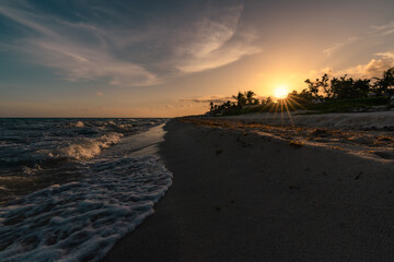 beautiful sunset in the mexican caribbean coast - sun star