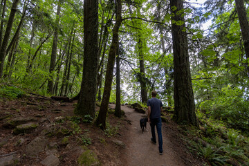 Man on a Hike with Dog in Eugene Oregon