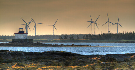 lighthouse with wind turbines