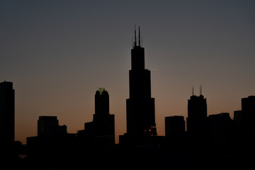 Fototapeta na wymiar Silhouette of Chicago Skyline over the sunset sky during summer