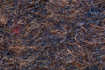 Brown felt texture in extreme close up