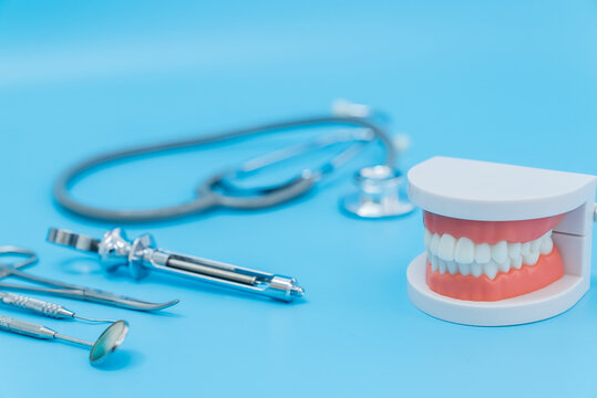Shot of Oral dental care equipment putting in blue background. 
