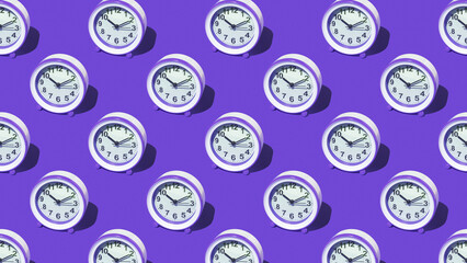 Fototapeta na wymiar A pattern of purple alarm clocks on a purple background.