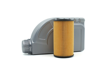 Motor oil and oil filters over white background