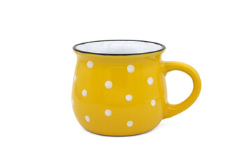 Yellow with white dots cup isolated on a white
