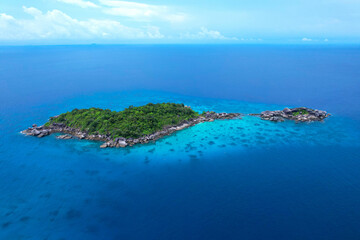 Fototapeta na wymiar aerial view of the Similan Islands, the Andaman Sea, with natural blue waters, tropical seas, impressive views of the island's beauty. The island is shaped like a heart.