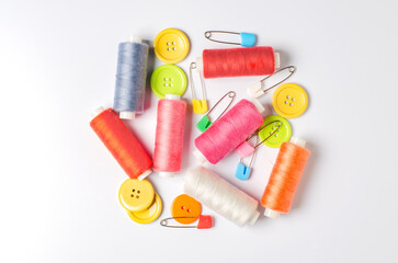 Accessories for sewing on a white background. Closeup.