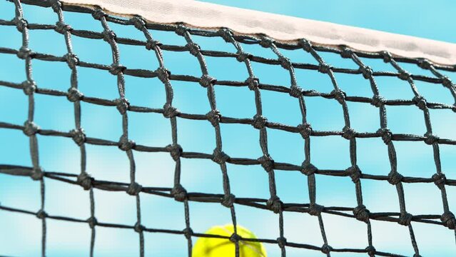 Super Slow Motion Shot of Tennis Ball Hitting the Net at 1000fps.
