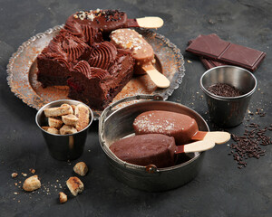 Chocolate desserts on dark background.