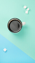 Cup of coffee on color background.