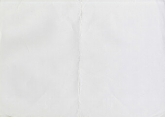 High resolution large image of white paper texture background scan folded in half, soft fine grain...