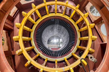Large electric motor with color details in plant workshop