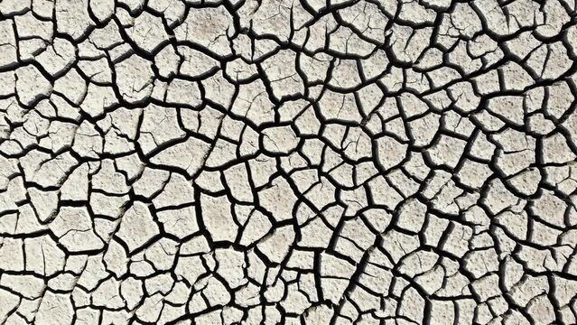 Aerial Drone Shot of Cracked Mud on Dry Lake as a result of years of severe drought.  Lake-bed is located near Reno, Nevada