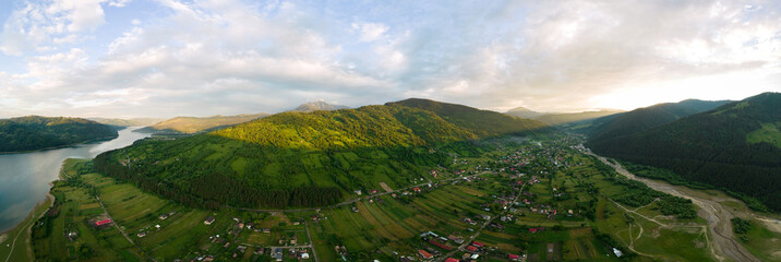 Aerial drone panoramic view of nature in the Carpathians in Romania at sunset