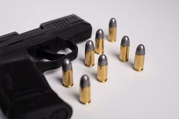 black gun and bullets