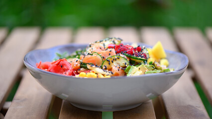 Salmon poke with avocado, seaweed, pickled red ginger and cucumber